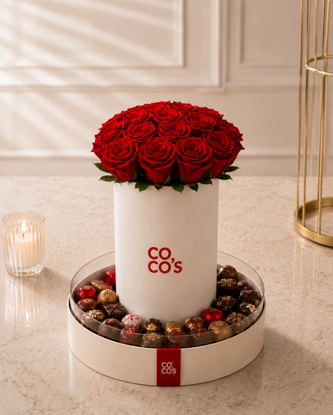 Ivory Coco's box with red roses and Belgian pralines