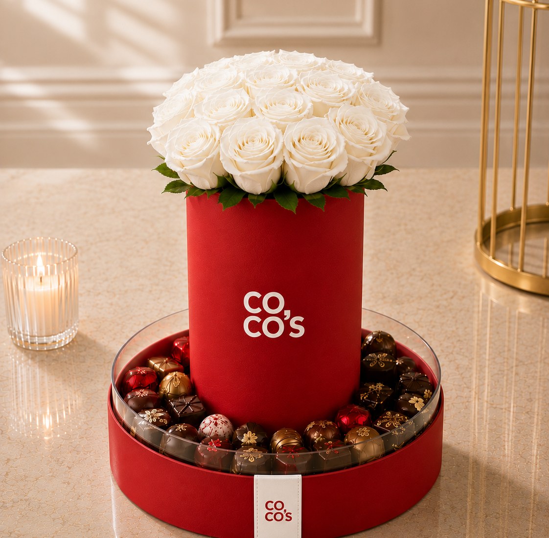 Red Coco's box with white roses and Belgian pralines